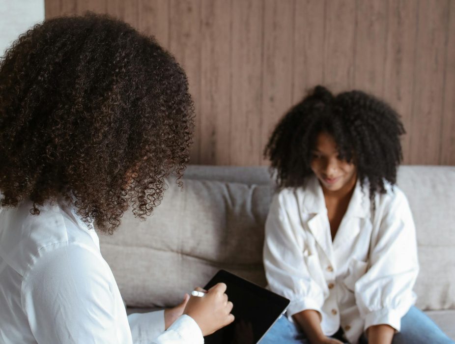 two-women-in-a-psychotherapy-session-discussing-mental-health-issues.-5234573-scaled